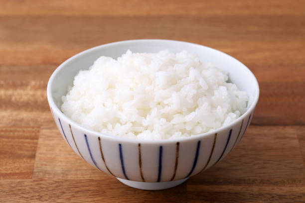 istock Japanese cooked white rice in a bowl 1226105005
