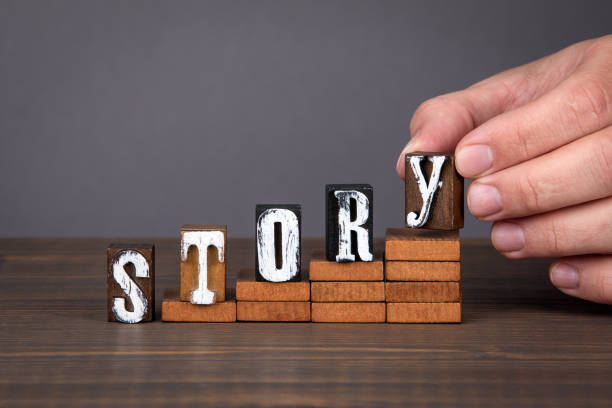 istock STORY concept. Wooden alphabet letters on steps 1226107254