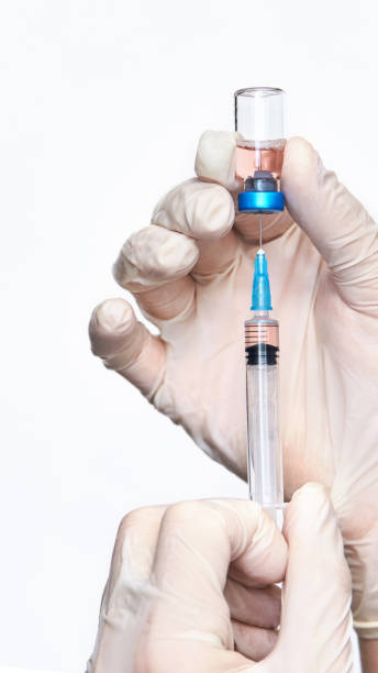 istock Hand in glove hold vaccine. 1226111073