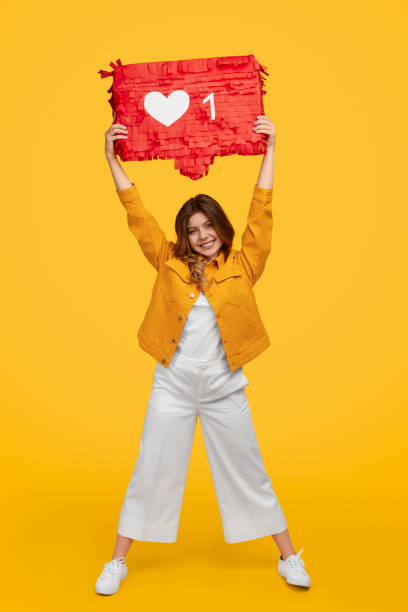 istock Smiling lady with like banner 1226111115