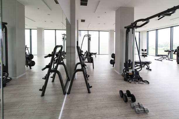 istock Large Modern Gym With Workout Equipment 1226111265