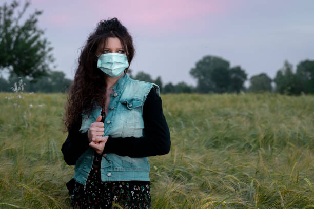 istock woman out in the field 1226112718