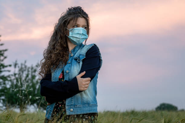 istock woman out in the field 1226113321