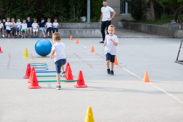 istock Group of children working on polygon.  Sport school 1226119365