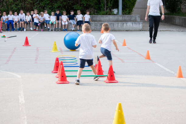 istock Group of children working on polygon.  Sport school 1226119369