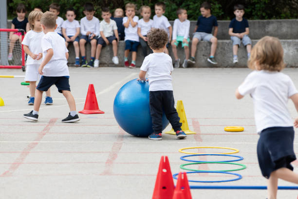 istock Group of children working on polygon.  Sport school 1226119377