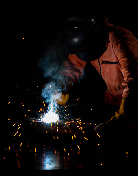 istock Metal industry workers are welding steel sheets for real estate projects received. 1226120351