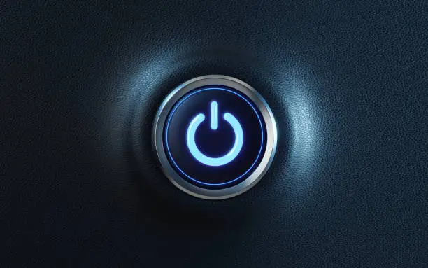 Car start button on dashboard. Horizontal composition with copy space. Front view.