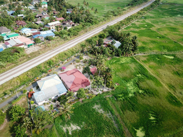 istock Kampung house beside railway. 1226123194