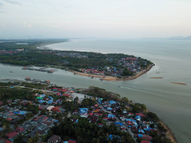 istock A boat back home from sea at Kuala Muda 1226125918