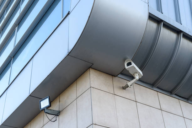 istock The surveillance camera is mounted on the corner of a modern building. 1226132892