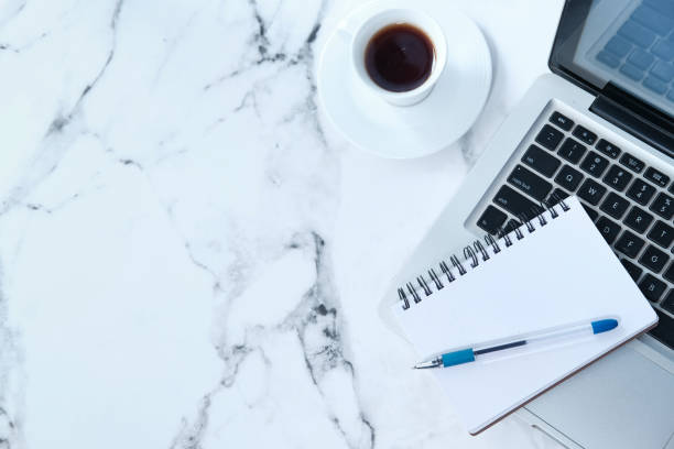 istock Top view of laptop, notepad, tea with copy space 1226137765