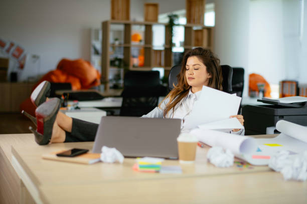 istock Happy businesswoman finished her work. 1226146786