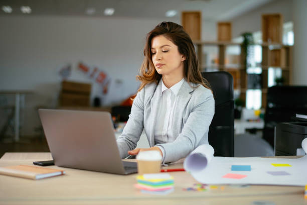 istock Young businesswoman working in office. 1226146831