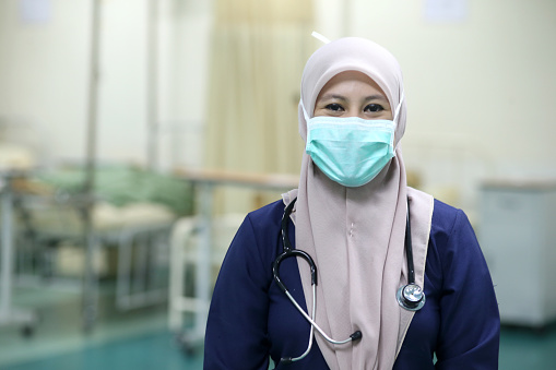 Portrait of Muslim female frontliner in Malaysia.