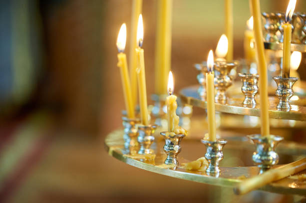 istock Three-tier candlestick with candles in the Orthodox Church 1226149985