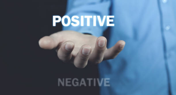 istock Man holding Positive and Negative words. Positive 1226151334