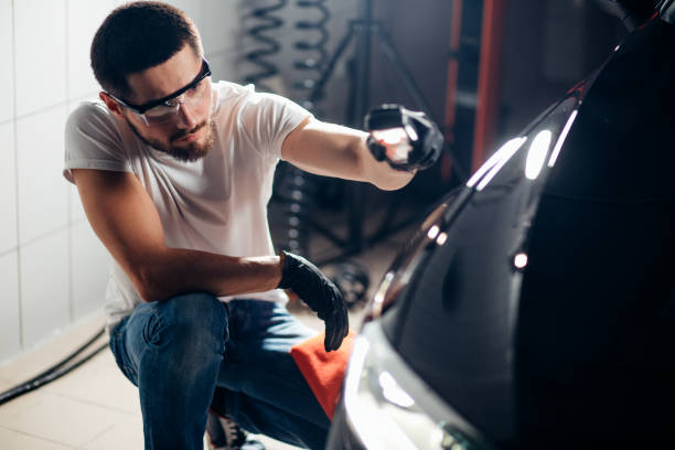istock man checks polishing with a torch 1226158357