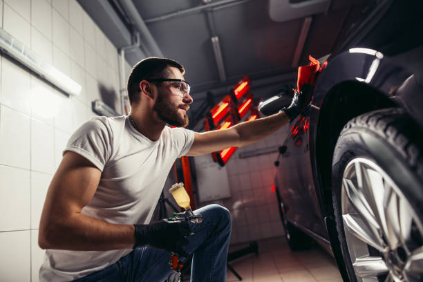 istock man cleaning car with microfiber cloth, car detailing or valeting concept 1226159066
