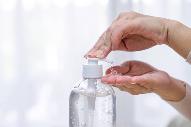 istock Women's hands washed with alcohol gel. 1226160511