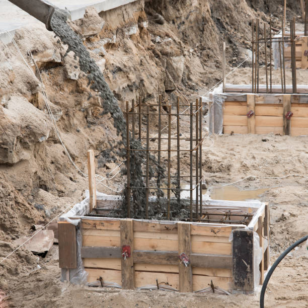 istock The process of pouring concrete into the formwork with rebar. Construction site, details. 1226161297
