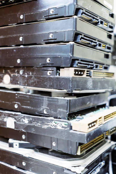 istock Pile of computer hard disks in recycling plant 1226167706
