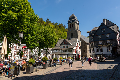 Monschau, Germany - May 17, 2020: Lively market place in the town center