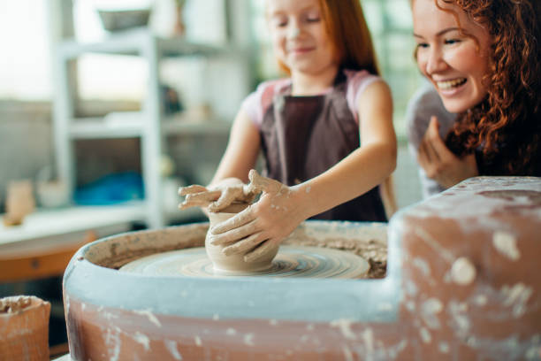 istock teacher and student make pitcher of pottery wheel 1226172185