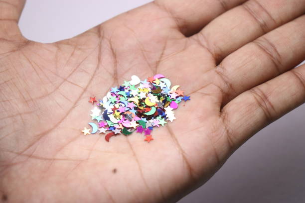 istock Decorative ornaments used in christmas tree decoration held in hand 1226173004