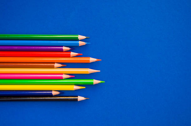 istock Colorful pencils on blue background. 1226177924