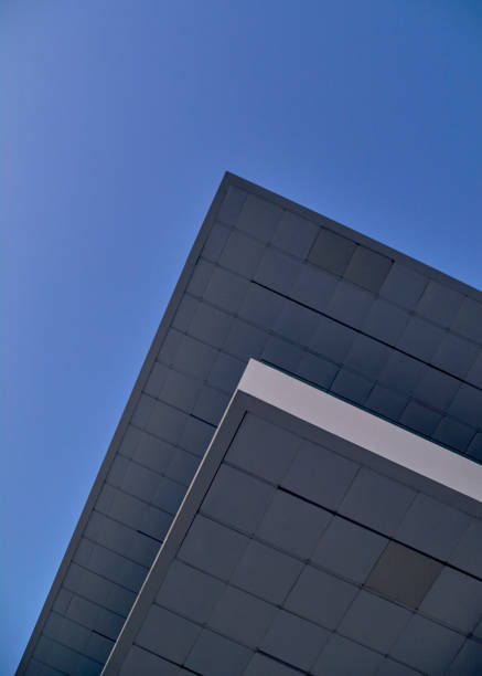 istock Modernist building roof in blue sky 1226181269