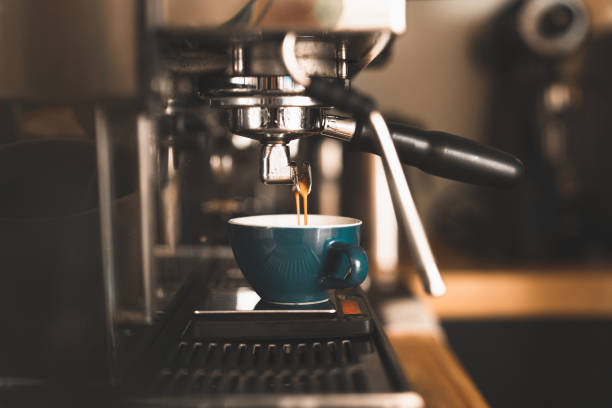 istock Fresh espresso pouring down into a glass 1226181727