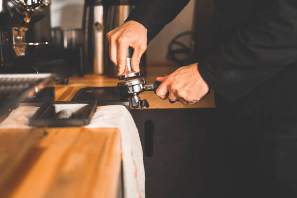 istock Barista preparing ground coffee for an espresso 1226181765