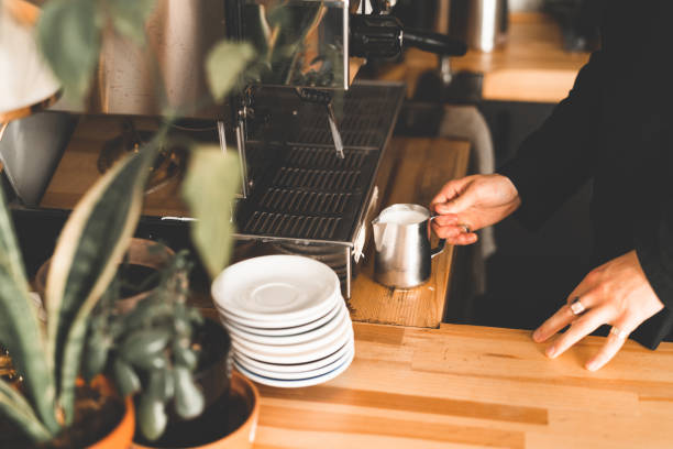 istock Barista steaming fresh milk for a coffee order 1226181767