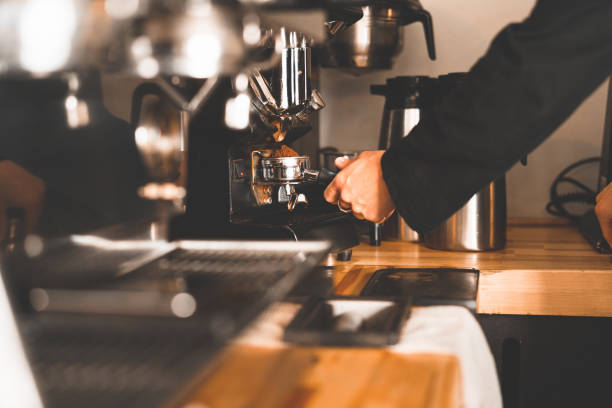 istock Barista preparing ground coffee for an espresso 1226182910