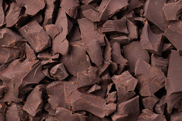 istock broken bars dark chocolate background, dessert food 1226183178