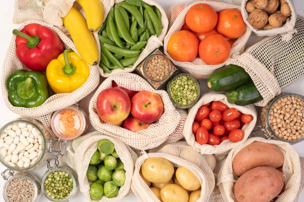 istock Zero waste concept. Fruits and vegetables in eco friendly reusable bags 1226186196