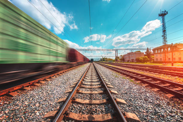 istock freight train moves with speed by rail 1226186386