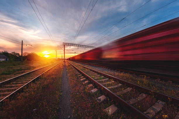 istock freight train moves with speed by rail 1226186413