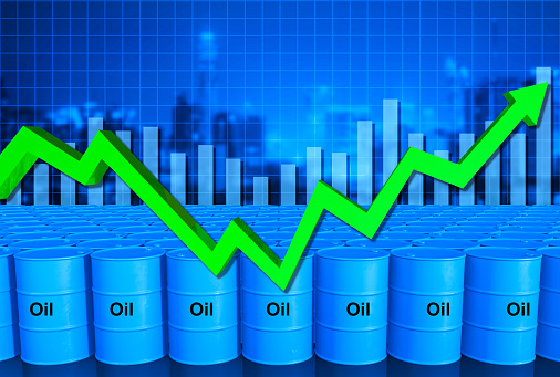 Chart direction up trend on green arrow with blue theme background group of oil tank in the stock , 3d rendering picture