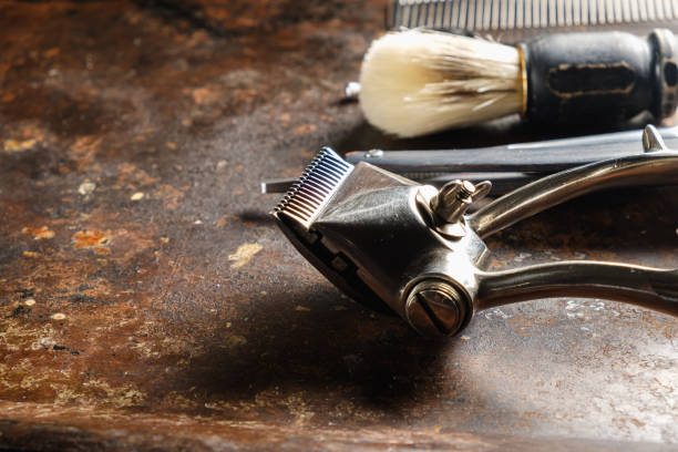 istock On a rusty surface are old hairdresser tools. comb, hairdressing scissors. rustic. horizontal . copy space. 1226187532