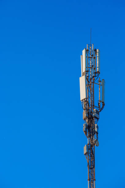 istock Mobile communications antenna against a blue sky 1226188272