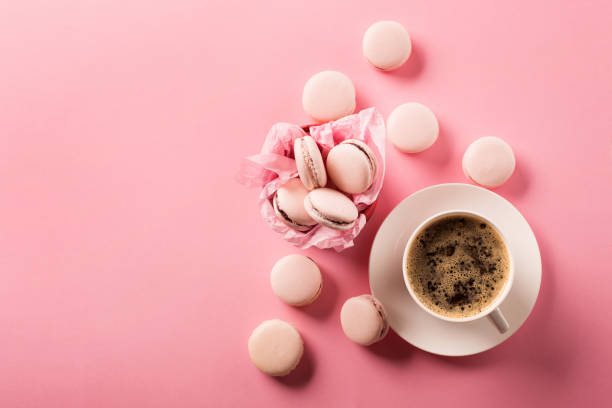 istock Sweet roze macarons present on old pink background with copy space 1226188338