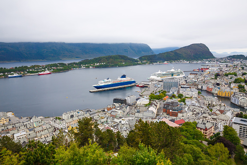 Alesund, Norway - June 10, 2018 - City top view from the Aksla mountain, fjord and cruise ships.