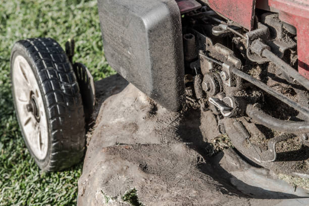 istock Heavy grimed up and dirty petrol mower engine, prior to its annual service. 1226188961