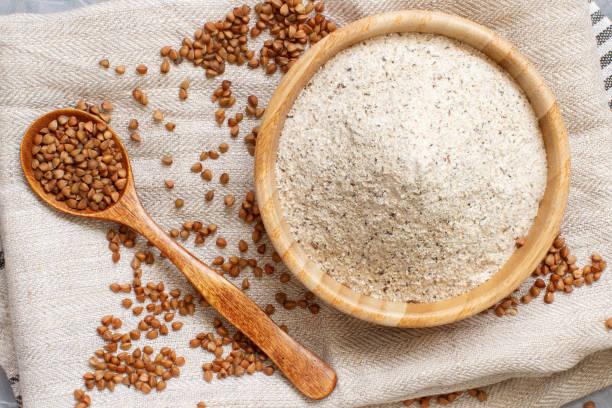 istock Buckwheat flour in a bowl buckwheat grain 1226189034