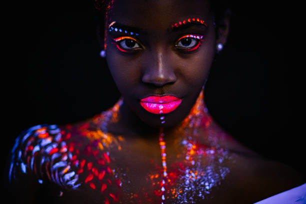 istock beautiful girl with creative fluorescent prints on skin 1226190931