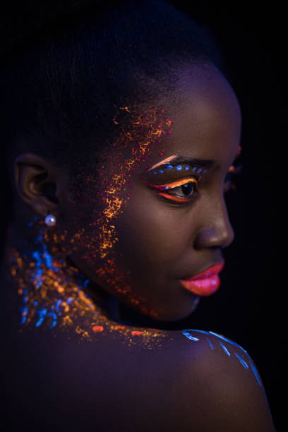 istock young woman with colorful abstract make-up 1226191142
