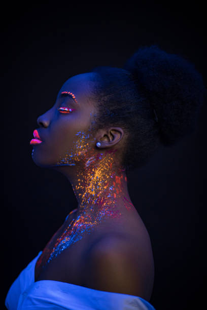 istock attractive african lady with fluorescnet luminescence prints on skin 1226191234