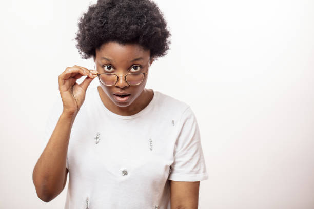istock surprised african woman staring at something 1226192406